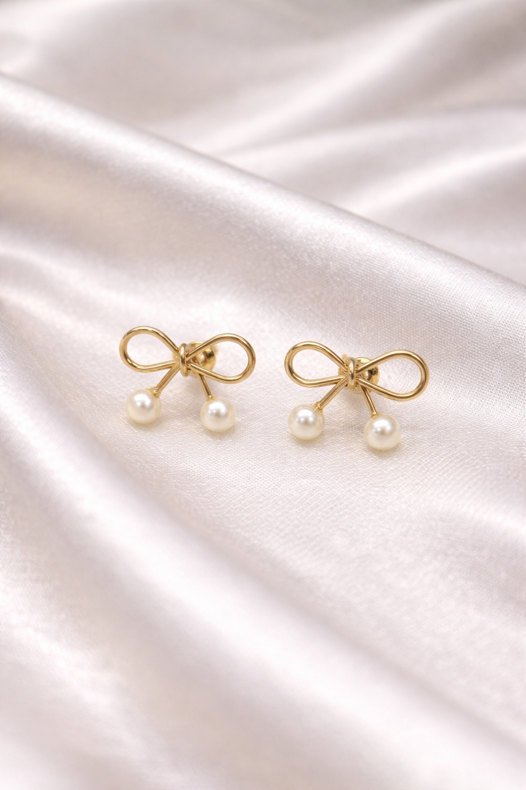Pearl Bow Studs